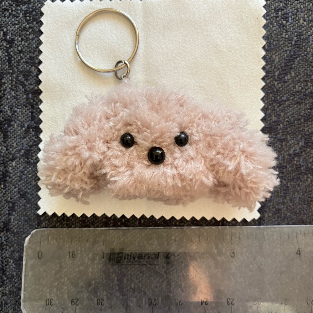 twisting stick dog keychain